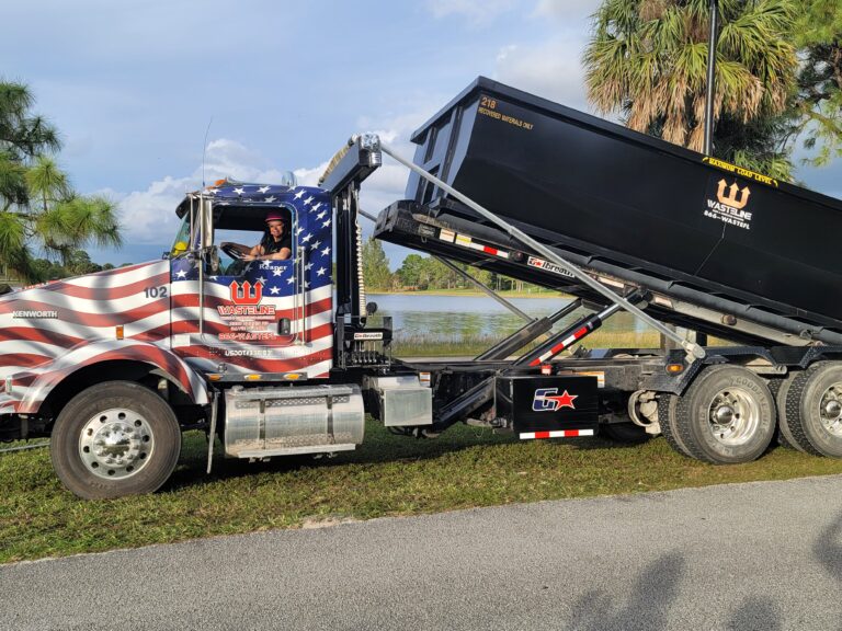 Wasteline Solutions dumpster truck on job site