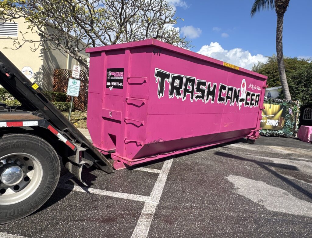 Wasteline Solutions pink dumpster Junk Removal