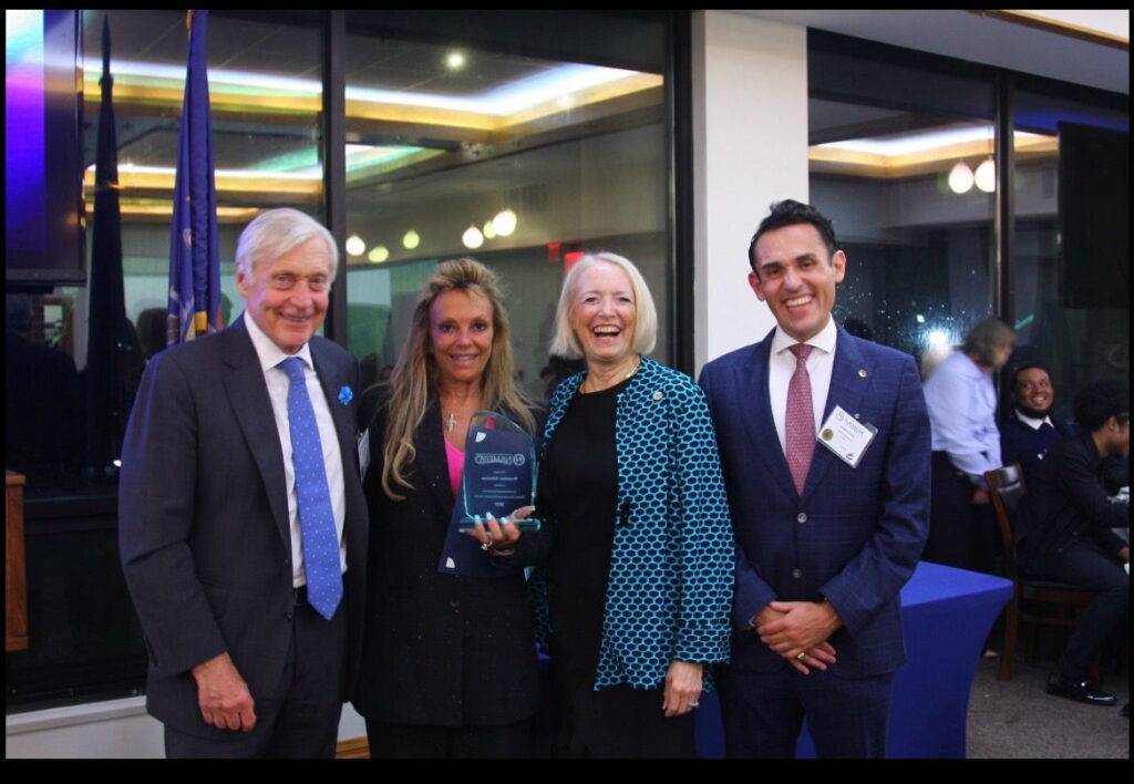 Wasteline Solutions Founder Tina Goldstein receiving the NAMEPA award